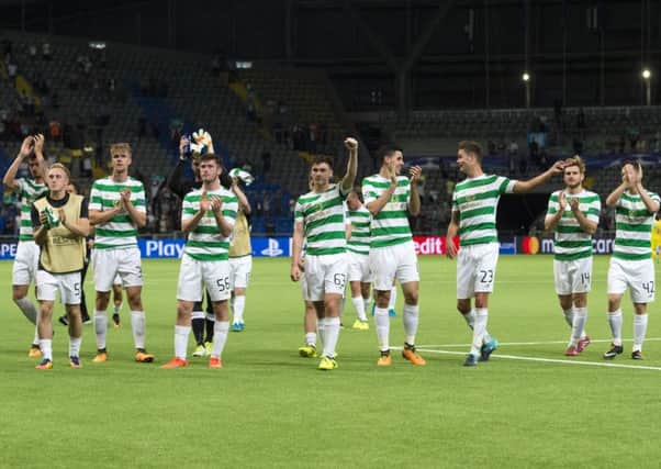 Celtic players celebrate after advancing past Astana. Picture: SNS