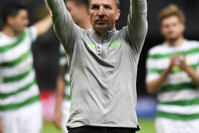 Brendan Rodgers salutes Celtic fans after the 4-3 defeat at Astana. Picture: SNS.