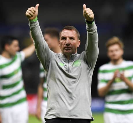 Brendan Rodgers salutes Celtic fans after the 4-3 defeat at Astana. Picture: SNS.