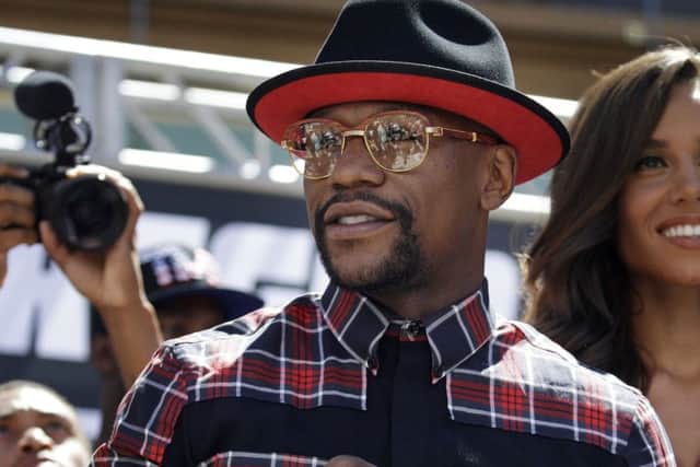 Floyd Mayweathercould earn $200m from the fight while Conor McGrego may pocket $100m. Picture: AP.
