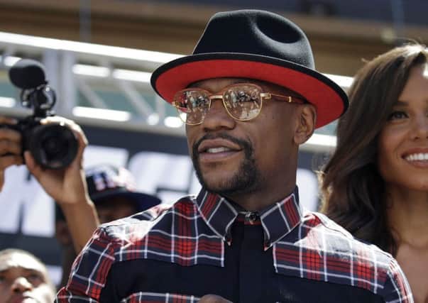 Floyd Mayweathercould earn $200m from the fight while Conor McGrego may pocket $100m. Picture: AP.