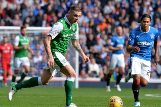 Anthony Stokes, pictured in action against Rangers at Ibrox, has had an indifferent start to his latest spell at Hibs. Picture: Getty Images