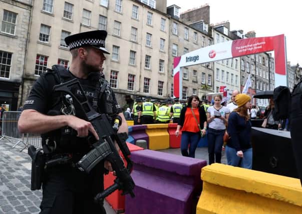 As well as the erection of barriers to stop a vehicle attack, armed officers have patrolled the Edinburgh festival to increase security.