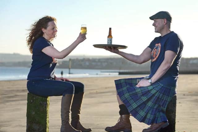 Bellfield marketing manager Anna Orr with brewer Kieran Middleton. Picture: Neil Hanna