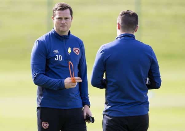 Jon Daly oversees training ahead of the weekend trip to Fir Park. Picture: SNS