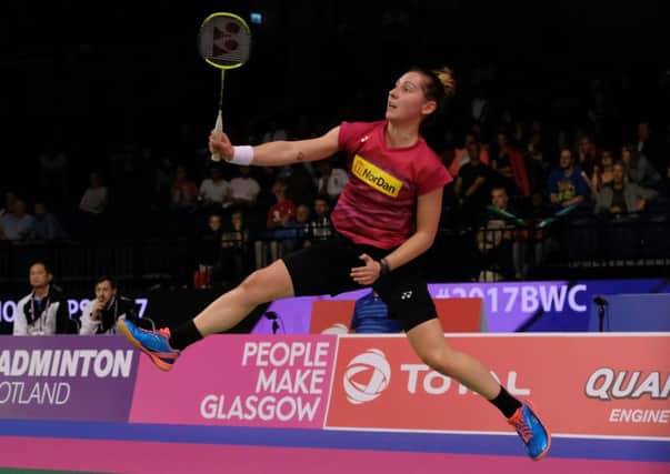 Kirsty Gilmour leaps to play a shot in her victory over He Bingjiao in Glasgow. Picture: Lorraine Hill