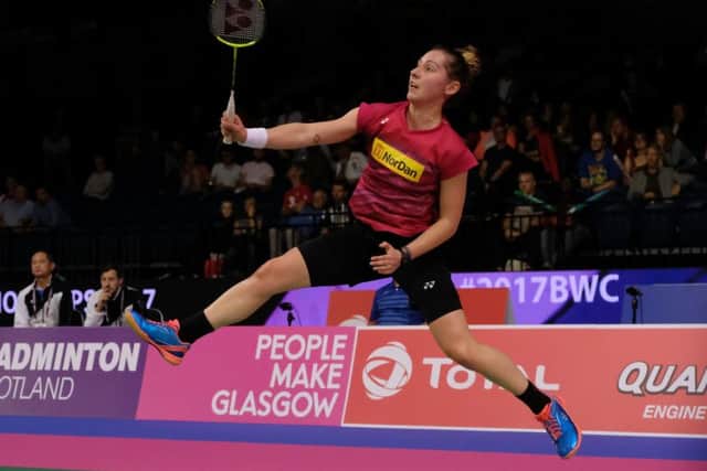 Kirsty Gilmour leaps to play a shot in her victory over He Bingjiao in Glasgow. Picture: Lorraine Hill