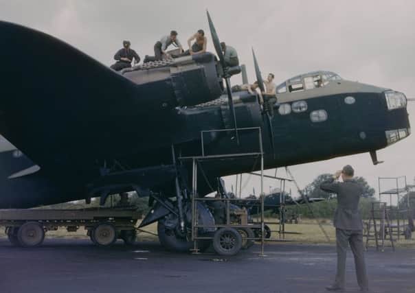 Mechanics servicing the engines of a Short Stirling heavy bomber, World War II, circa 1943. Picture: Fox Photos/Hulton Archive/Getty Images