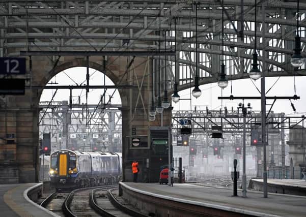 Train travel has been disrupted after a car crashed into a rail bridge. Picture: Jeff J Mitchell/Getty Images