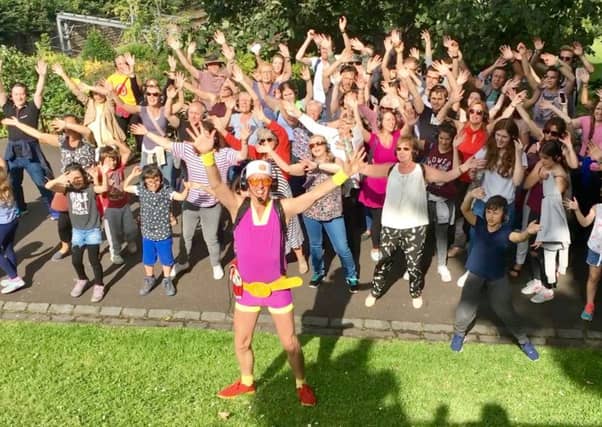 Guru Dudu takes his group on a journey through Edinburgh with Disco hits.