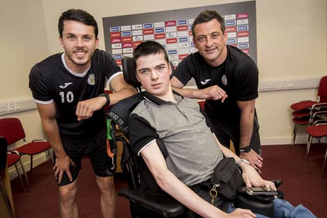 St Mirren fan and aspiring journalist Kyle Gunn is pictured with Buddies boss Jack Ross (right) and player Lewis Morgan. Picture: SNS/Bill Murray