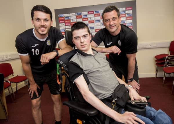 St Mirren fan and aspiring journalist Kyle Gunn is pictured with Buddies boss Jack Ross (right) and player Lewis Morgan. Picture: SNS/Bill Murray