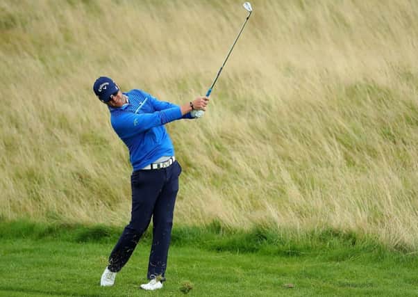 Marc Warren hits his second shot on the third hole during day two of Made in Denmark at Himmerland. Picture: Getty Images