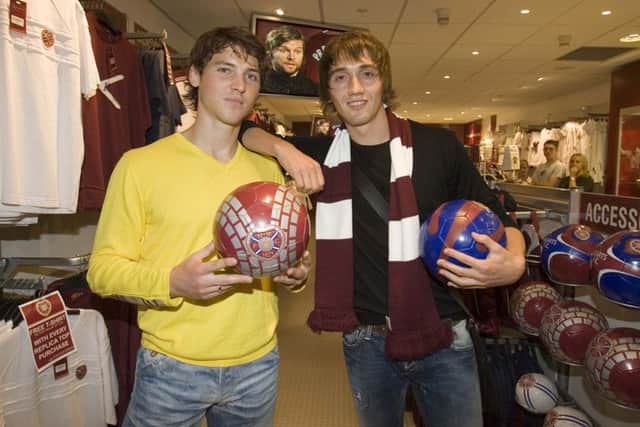 Heart of Mid-Lithuania: Saulius Mikoliunas and Deividas Cesnauskis open a new Hearts shop in 2006. Photograph: Aubrey Washington/SNS