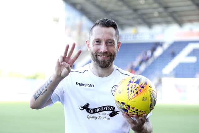Stephen Dobbie with the match ball. Picture: Michael Gillen