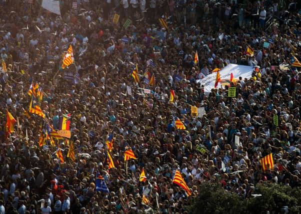 People march during a demonstration against the last week's terrorist attacks  in Barcelona. Picture Getty