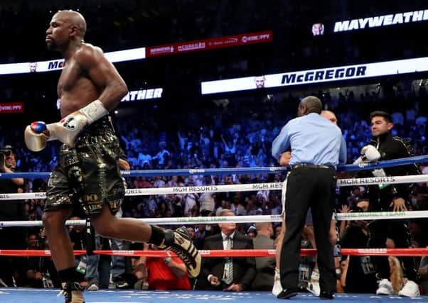 Referee Robert Byrd stops the fight in round 10 with a TKO of Conor McGregor by Floyd Mayweather Jr. Picture; Getty