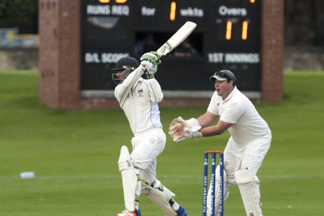 Hayes van der Berg off-drives early in his match-winning century for Heriot's on Saturday. Picture: Andrew O'Brien