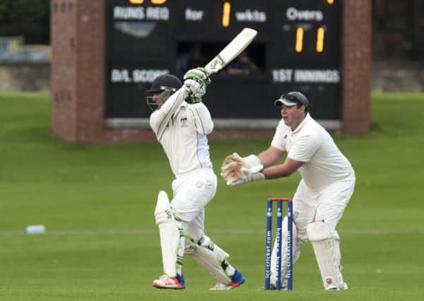 Hayes van der Berg off-drives early in his match-winning century for Heriot's on Saturday. Picture: Andrew O'Brien