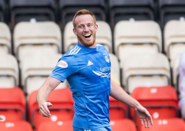 Adam Rooney is determined to be in the Aberdeen line-up every week. Picture: SNS.