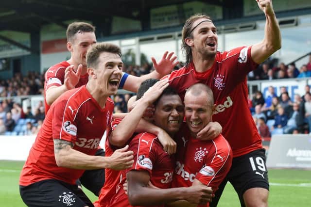 Rangers' Alfredo Morelos (centre) celebrates making it 2-0 with his team-mates. Picture: SNS/Craig Williamson