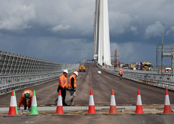 Final works being carried out on the Queensferry Crossing, the new road bridge over the Firth of Forth. Picture: Jane Barlow/PA Wire