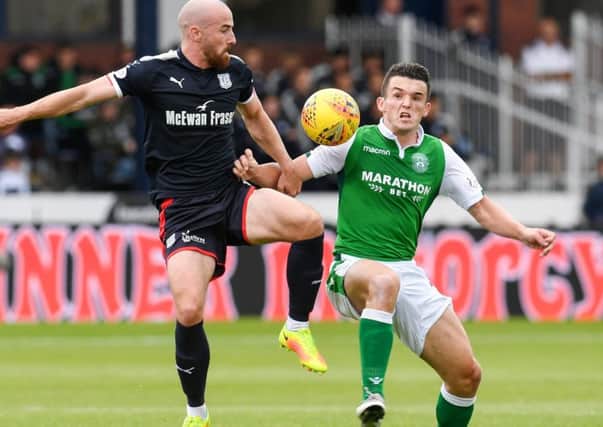 Nottingham Forest have offered Â£750,000 for John McGinn, right. Picture: SNS.