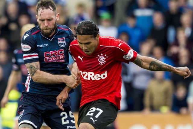 Carlos Pena, right, did not impress after coming off the bench for Rangers. Picture: SNS