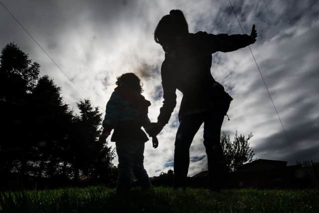 11/08/17 . GLASGOW. Stock shot of adult smacking child. smack, parent smacking.