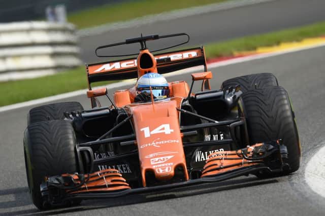 Fernando Alonso quit on lap 27  his seventh retirement already of a miserable McLaren season. Picture: John Thys/AFP/Getty Images