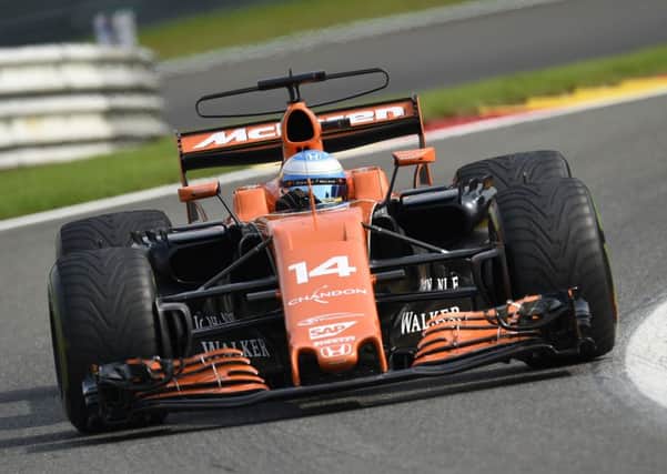 Fernando Alonso quit on lap 27  his seventh retirement already of a miserable McLaren season. Picture: John Thys/AFP/Getty Images
