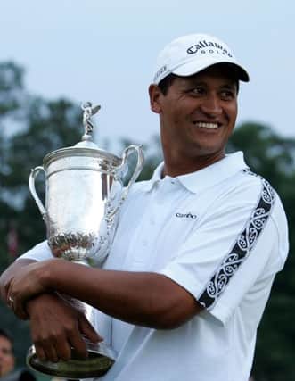 Michael Campbell cradles the US Open trophy after his two-shot win at Pinehurst in 2005. Picture: Getty Images