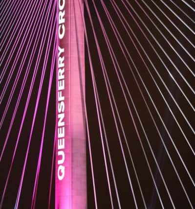 A view of the new Queensferry Crossing, seen from South Queensferry, as it is illuminated ahead of it's official opening by Queen Elizabeth II. Picture: Andrew Milligan/PA Wire