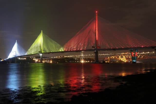 A view of the new Queensferry Crossing, seen from South Queensferry, as it is illuminated ahead of it's official opening by Queen Elizabeth II. Picture: Jane Barlow/PA Wire