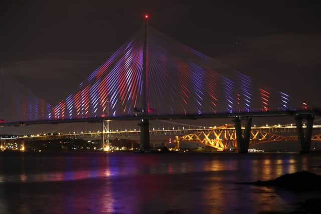 A view of the new Queensferry Crossing, seen from South Queensferry, as it is illuminated ahead of it's official opening by Queen Elizabeth II. Picture: Jane Barlow/PA Wire