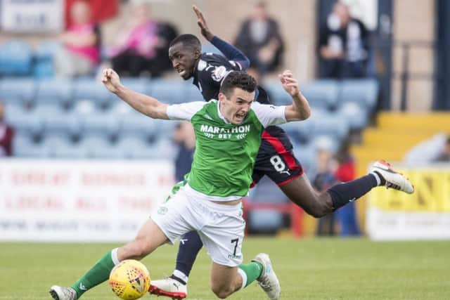 Hibernian's John McGinn is attracting interest from England. Picture: SNS/Bill Murray