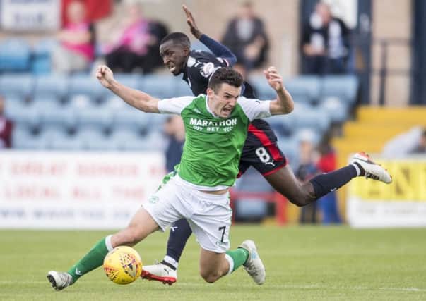 Hibernian's John McGinn is attracting interest from England. Picture: SNS/Bill Murray