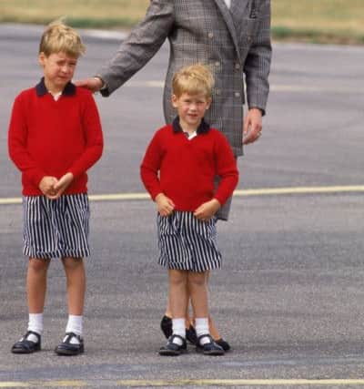 The Princess of Wales arrives at Aberdeen airport with her sons William and Harry, 14th August 1989. Picture: Jayne Fincher/Princess Diana Archive/Getty Images