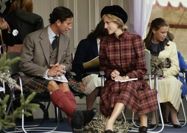 Prince Charles in highland dress and Princess Diana in a Caroline Charles suit at the Braemar Games, 1981. Picture: Terry Fincher/Princess Diana Archive/Getty Images