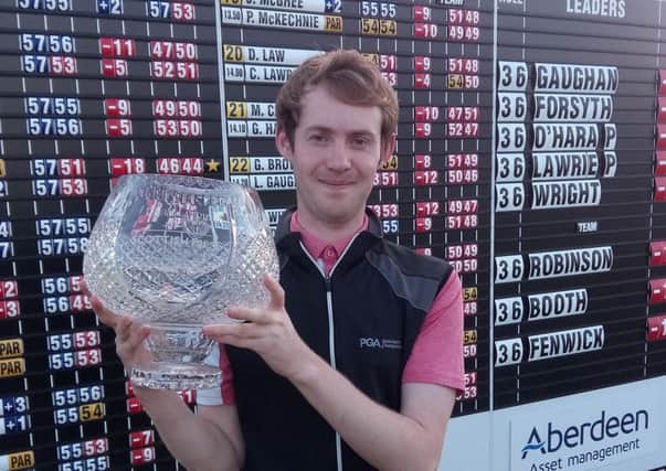 Louis Gaughan shows his prize after winning the Scottish Par-3 Championship..