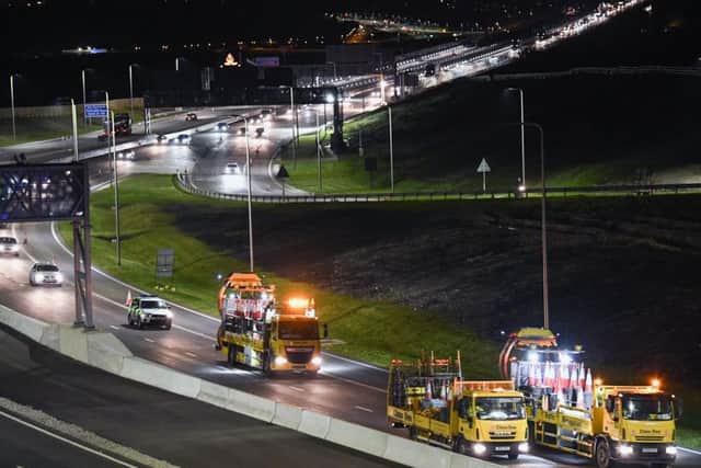 The first vehicles make their way in convoy across the new Queensferry Crossing (Photo by Jeff J Mitchell/Getty Images)
