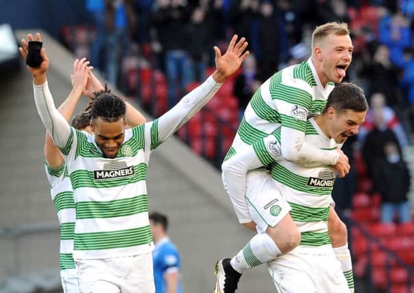 Jason Denayer, left, celebrating after Celtic defeated Rangers in the 2015 League Cup semi-final. Picture: Lisa Ferguson