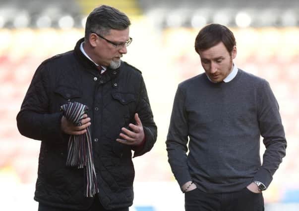 Craig Levein says he was only there to offer advice to the likes of Ian Cathro, right. Picture: SNS