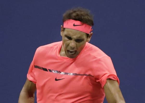 Rafael Nadal reacts after winning the first set against Dusan Lajovic, of Serbia, during the first round of the U.S. Open. Picture: Frank Franklin II/AP