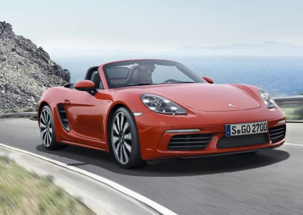 Switch on the ignition and the engine of the Porsche 718 Boxster settles into a throbby, off-beat, cammy exhaust burble.