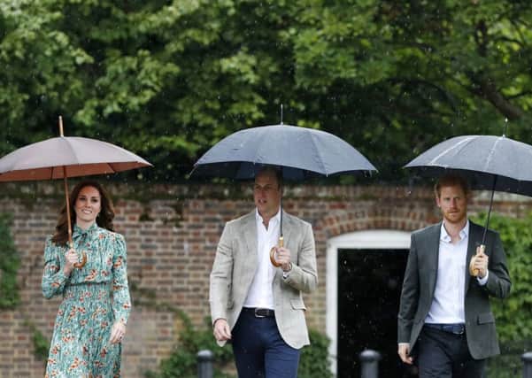 Diana's sons, princes William and Harry, reflect on their mother's death, which occurred 20 years ago today. Picture: Kirsty Wigglesworth/AFP/Getty Images