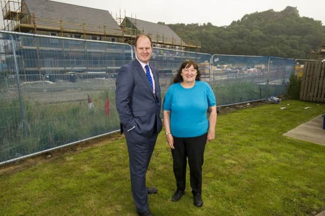 Bank of Scotland's Douglas Spowart with Forth Housing Association chair Margaret Turner. Picture: Chris Watt