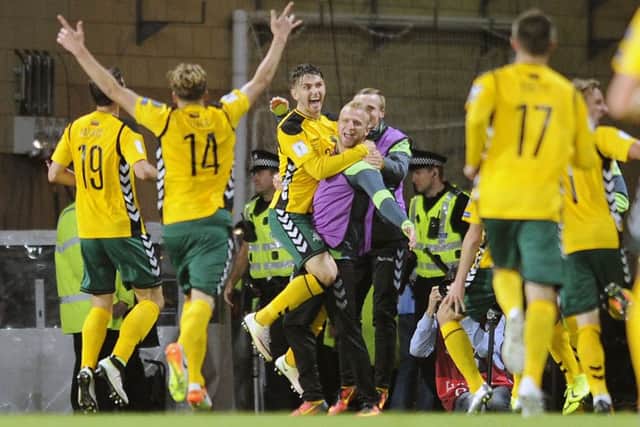Lithuania celebrate Fiodor Cernych's (No 22) goal against Scotland at Hampden last October. The match finished 1-1. Picture: Michael Gillen