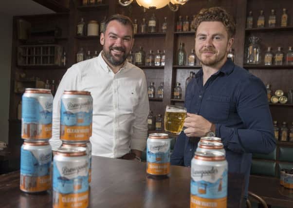 Scott MacDonald, left, with Brewgooder co-founder Alan Mahon. Picture: Contributed