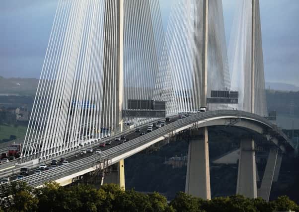 Morning traffic crosses the new Queensferry Crossing as it opens. Picture: Jeff J Mitchell/Getty Images